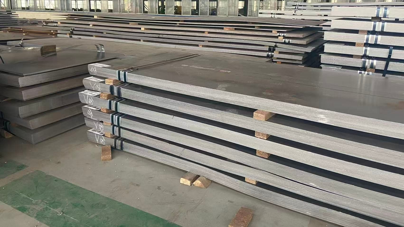 Bundles of shipbuilding steel plate held in stock at the ZCMetals warehouse in Wuhan