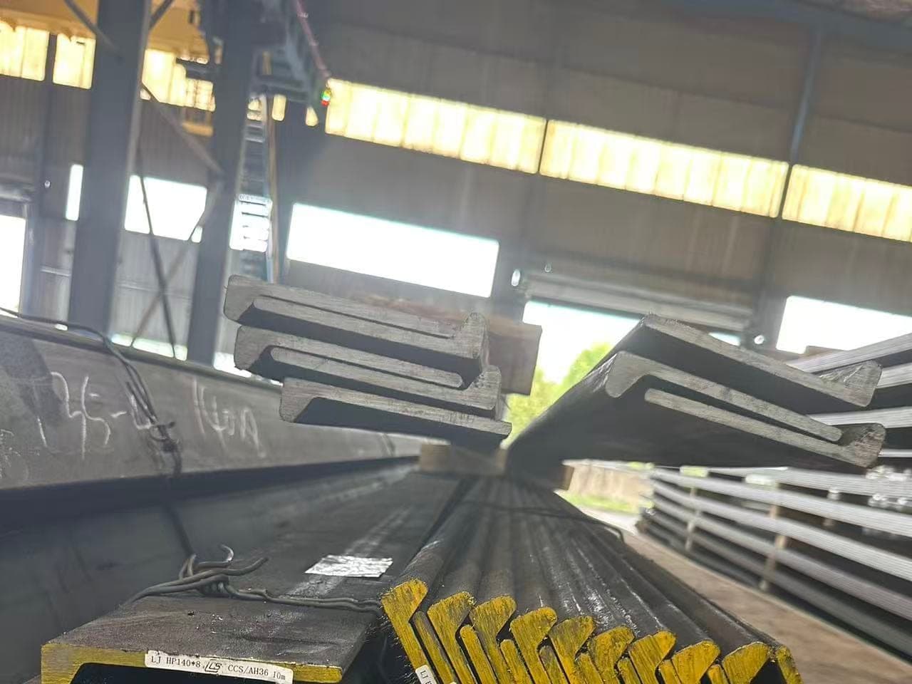 Grade tags on bulb flat bar bundles in the ZCMetals warehouse